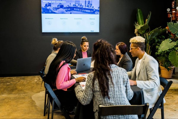 group of professionals around table